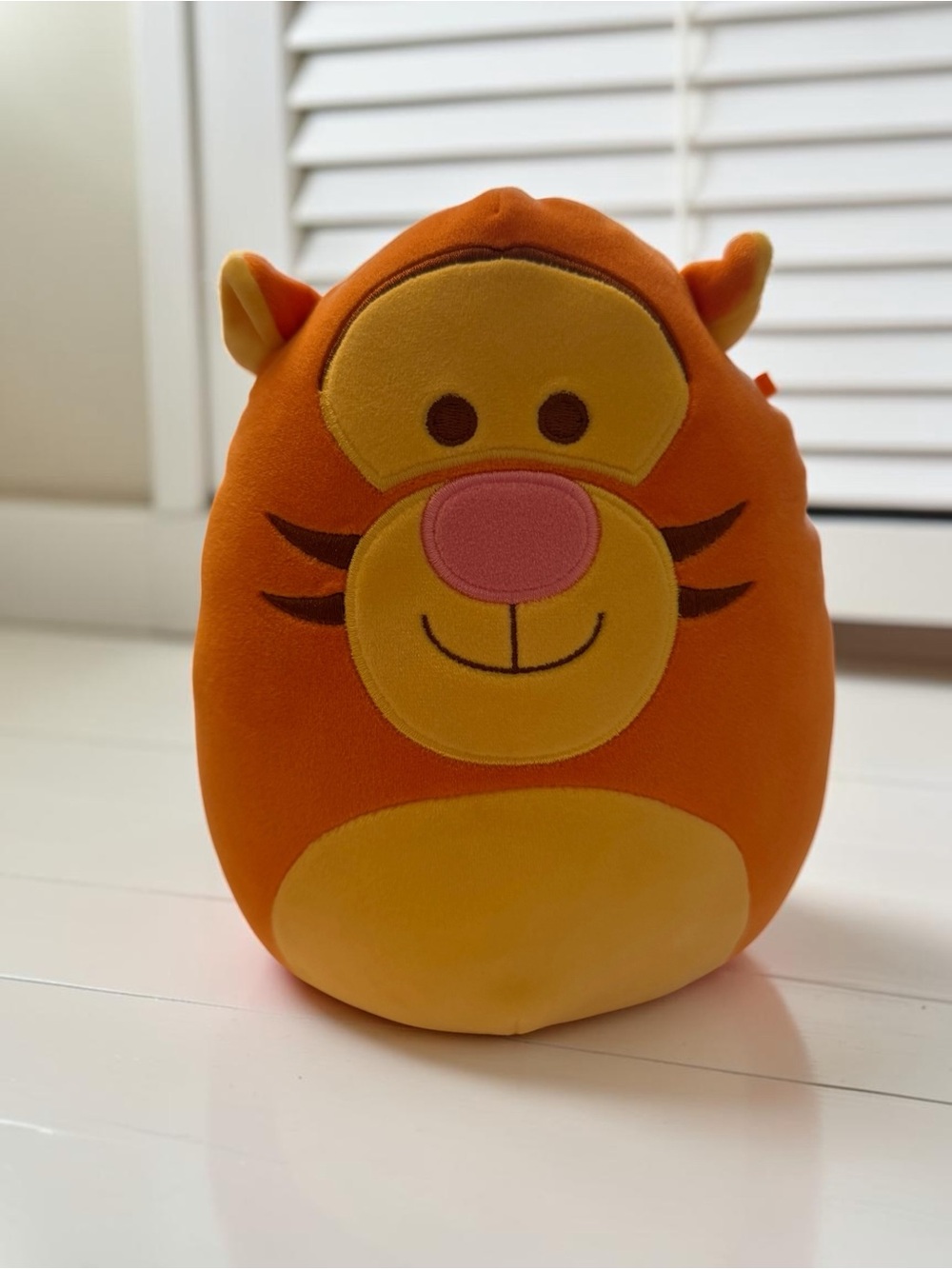 Bounce into comfort with this adorable, authentic Disney Tigger‎ Squishmallow!